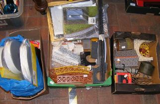 A selection of train accessories including buildin