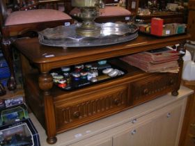 An Ercol two tier coffee table with two drawers be