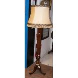 A reeded mahogany standard lamp