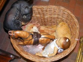 A linen basket containing vintage toys