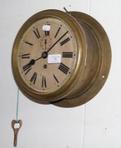 An Admiralty 1918 brass cased ships clock