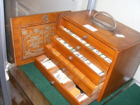 An old bone and bamboo Mah-jong set in fitted wood