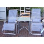 Two garden reclining chairs, together with a chrom