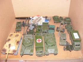 A quantity of Dinky and other model Army vehicles,