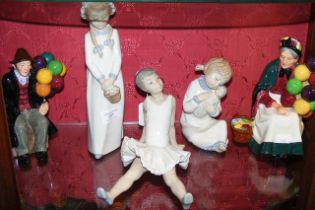 A selection of Royal Doulton and Nao figures