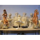 A Marilyn Monroe figurine, together with other fig