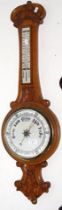 A late Victorian oak barometer/thermometer - 85cms