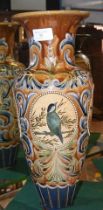 A Doulton Lambeth stoneware vase with finch and fo