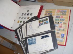 Two albums bearing Mint and used Canadian stamps,