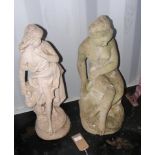 Two garden statues of robed women