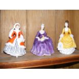 Three Royal Doulton female figurines - 'Noelle' -