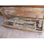 A vintage croquet set in wooden case