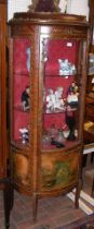 A reproduction French display cabinet
