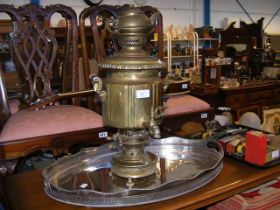 A brass Persian samovar, together with silver plat