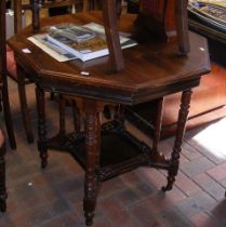 An Edwardian octagonal two tier occasional table