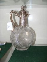 An attractive silver claret jug with etched owl de