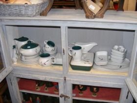 A quantity of Denby 'Greenwheat' serving and table