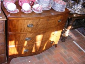 A 19th century bow front chest of drawers