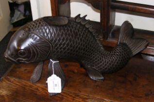 An antique bronze Oriental carp ornament - 40cms l