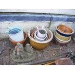 Various garden pots and a figural statue