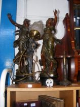 A pair of Spelter figures, together with interesti