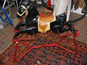 A vintage Mobo rocking horse