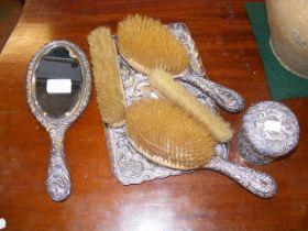 A silver backed dressing table set complete with r