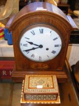 An oak cased eight day mantel clock, together with