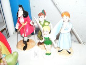 Four Walt Disney Peter Pan figurines