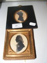 An 18th century silhouette painted by Charles, tog