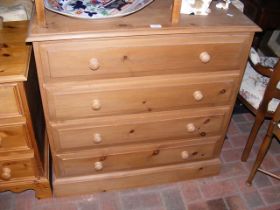 A four drawer pine chest