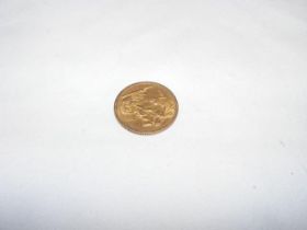 An 1887 gold sovereign coin