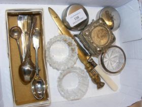 A collection of table salts, teaspoons