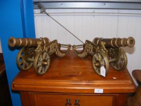 A pair of brass cannons