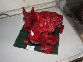 An unusual pair of glazed red Scottie Dog ornament