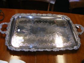 An antique two handled silver plated serving tray