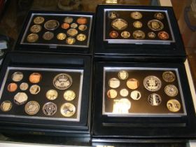 Four Royal Mint commemorative coin sets 2008, 2009