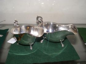 Two silver sauce boats