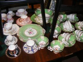 A selection of antique teacups and saucers, includ