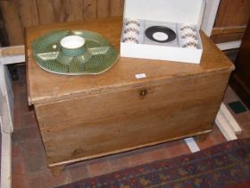 An antique pine blanket chest