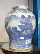 A large blue and white oriental vase