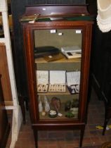 An Edwardian display cabinet