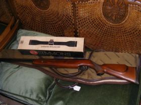 An H. Weihrauch air rifle, together with Simmons R