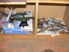 A collection of die cast model planes, including C