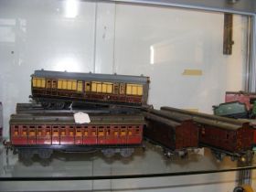 Six old Hornby tin plate 0 gauge wagons, coaches