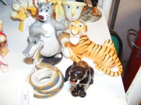 Four Walt Disney Jungle Book figurines