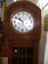 An oak cased Grandmother clock with chiming moveme