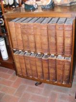 An old oak revolving bookcase for the Encyclopaedi