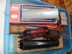 A boxed Lima 0 gauge freight wagon together with o
