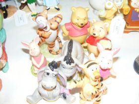 Eight Walt Disney Winnie the Pooh figurines